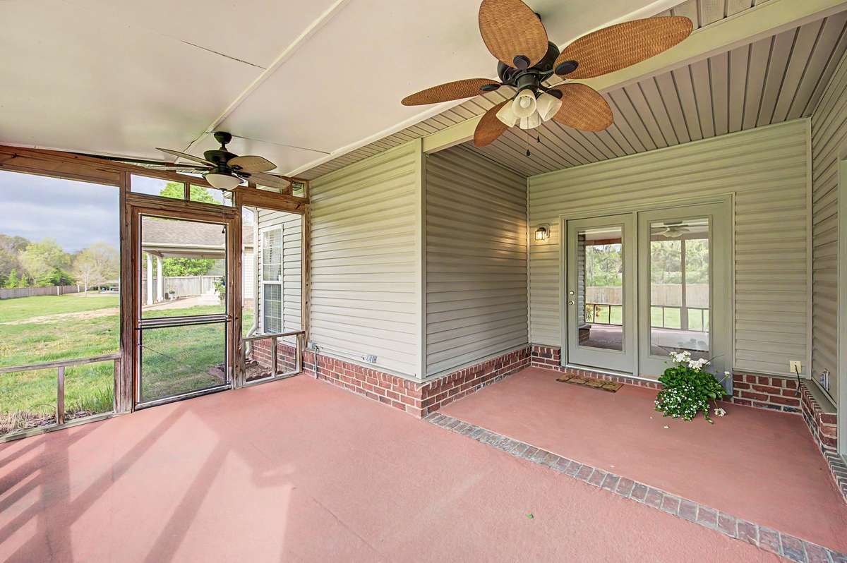 Screened porch provides a nice place for early morning coffee or a happy hour!