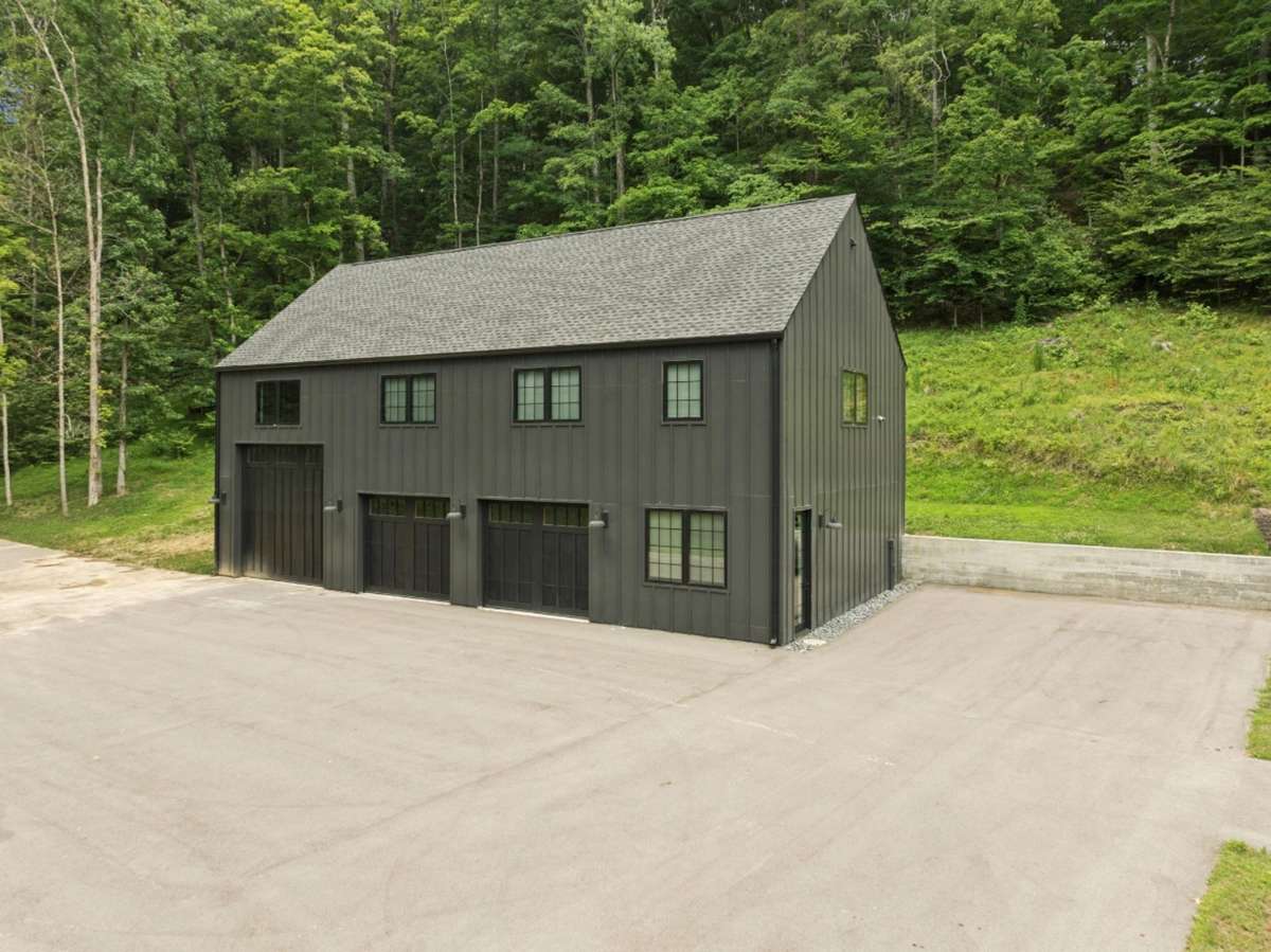 A 3-car garage provides generous parking and storage, with an expansive 1,500 sq ft flex space above—perfect for a private office, creative studio, or future guest suite.