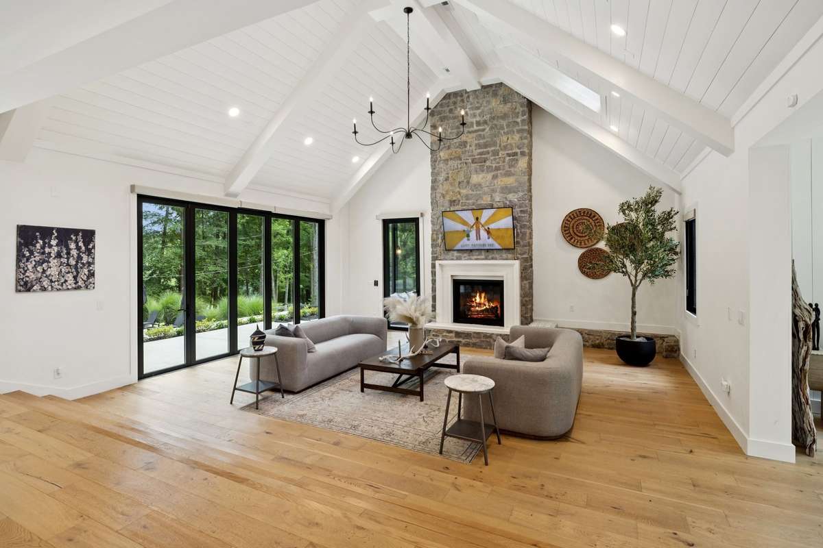 Smart home features are integrated throughout, offering convenience at your fingertips, while a whole-house water filtration system ensures pure comfort in every drop