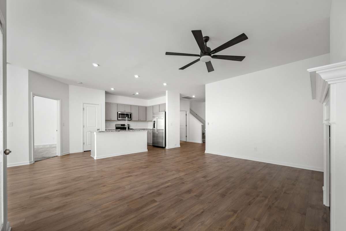 This open‑concept room feels incredibly spacious. Entertaining will be easy here.The seamless flow into the kitchen makes it feel even larger in person — it’s truly a space you need to experience, so scheduling a showing to see just how large it is.
