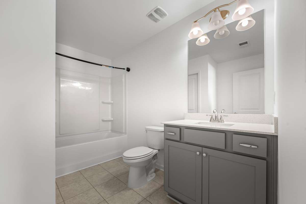The upstairs bathroom makes that bonus room on the second floor all that more functional.