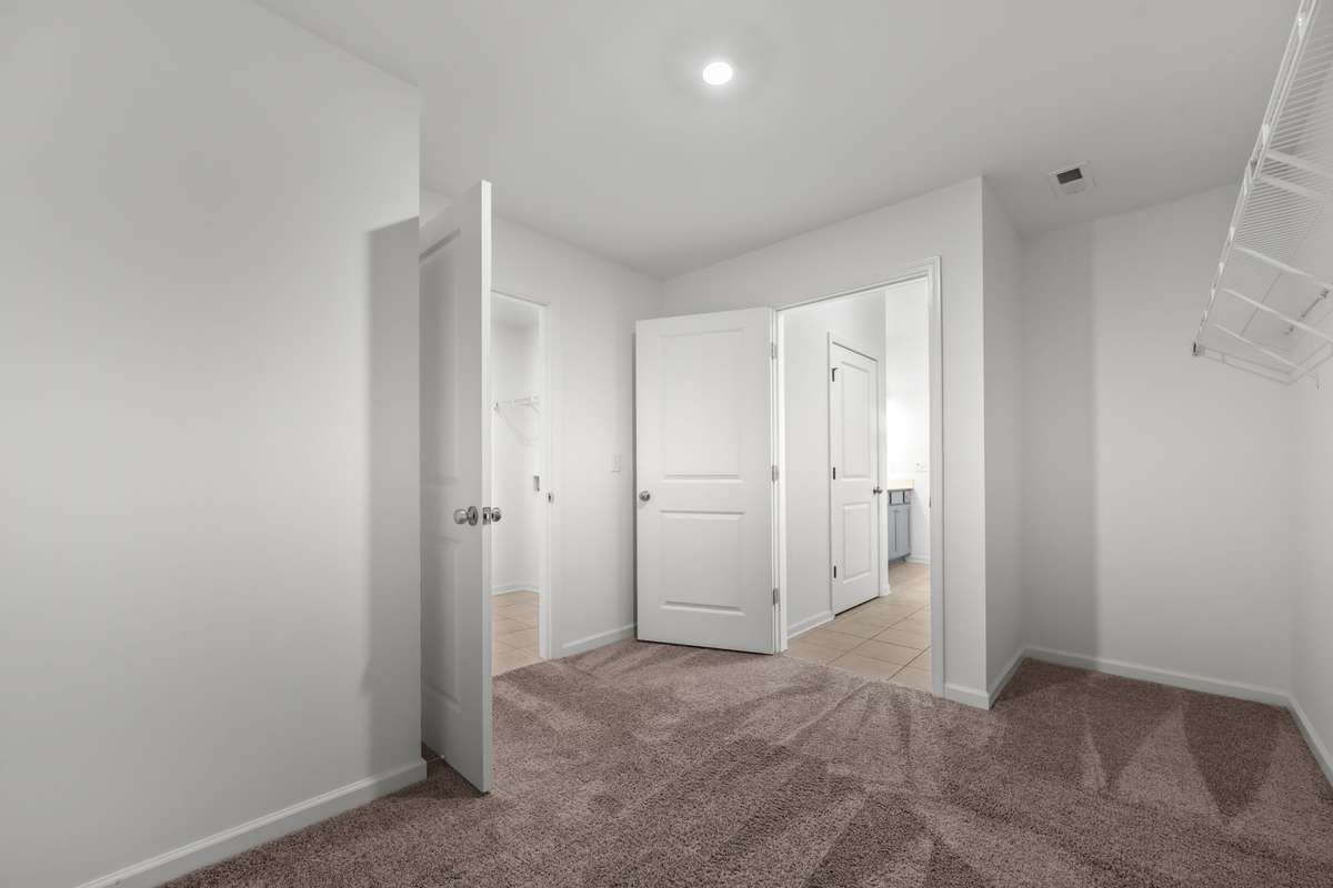 A large master closet that opens into your laundry room is a treasure to find. How easy to do your laundry and then walk right into your closet to put all your clothes away. What convenience!
