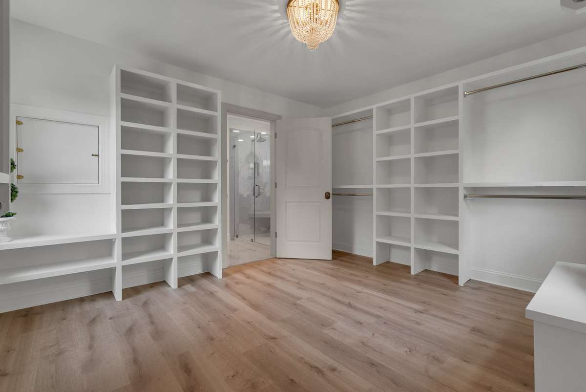 Primary Closet w/Laundry drop