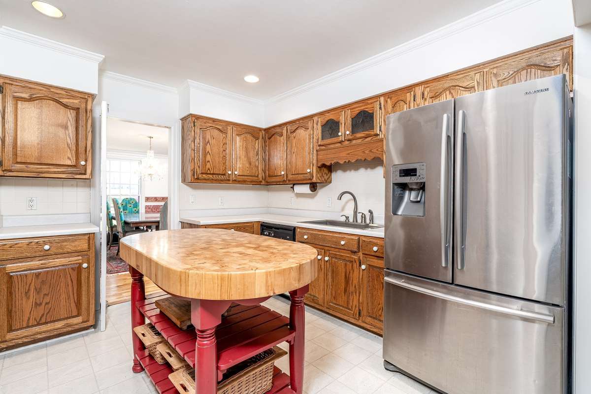 Stainless Steel Refrigerator conveys - A peek into the Dining Room/Sunroom