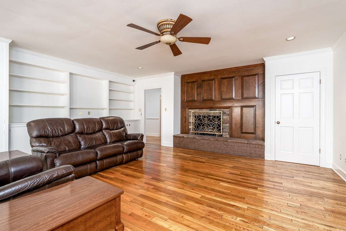 Beautiful sand and finished hardwood floors, Fireplace w/gas logs and a storage closet