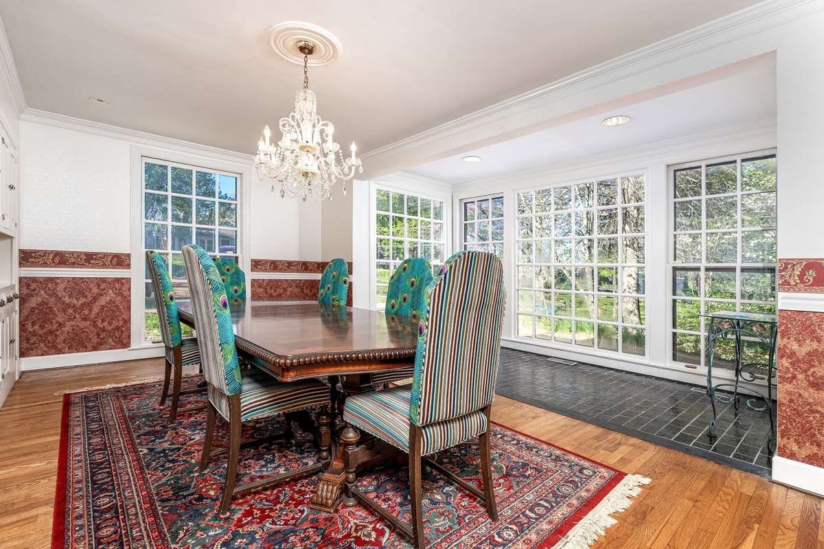 Formal and Separate Dining Room and Sunroom