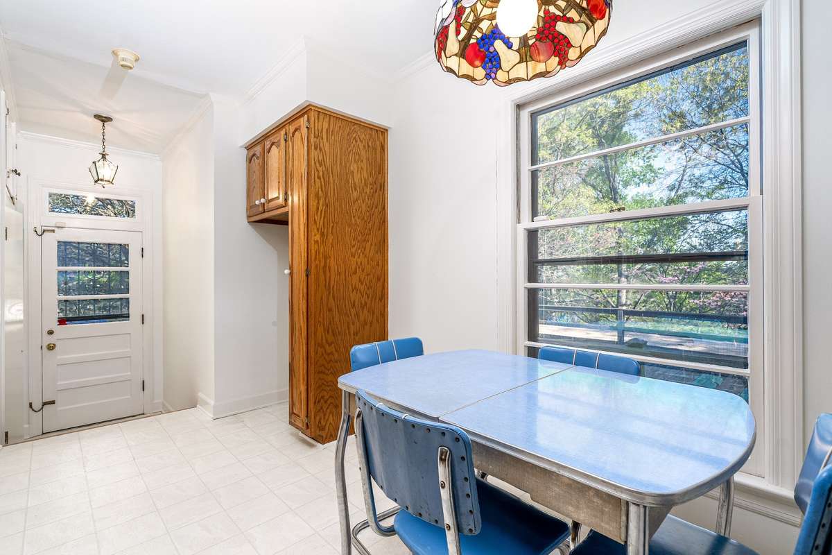 Smaller cabinet/Pantry to allow room for another Refrigerator or Freezer and another storage closet for those larger kitchen items