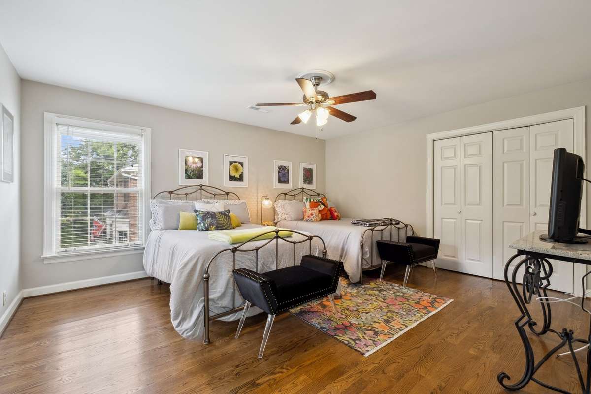 Bedroom number three also overlooks the front yard and has a large closet, updated ceiling fan, 2" blinds and blackout shades.