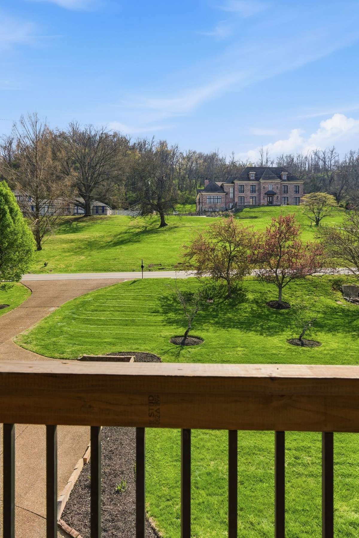 Off the second floor is a peaceful little balcony overlooking the front yard and rolling hills beyond.