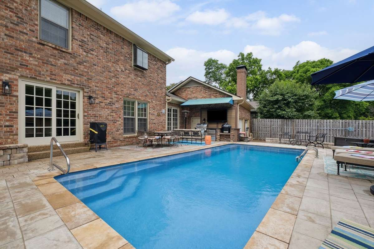 Swim laps year round in the heated fiberglass pool.