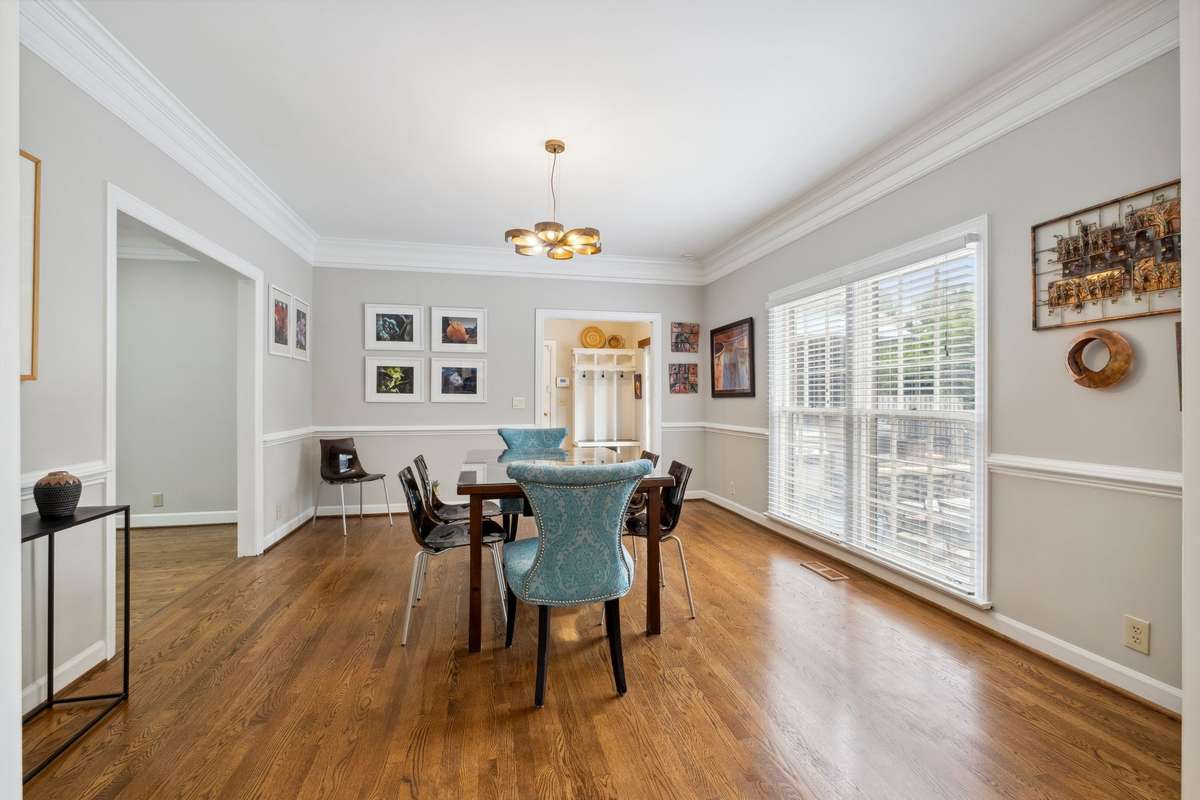Large windows overlook the pool and flood the room with natural light.