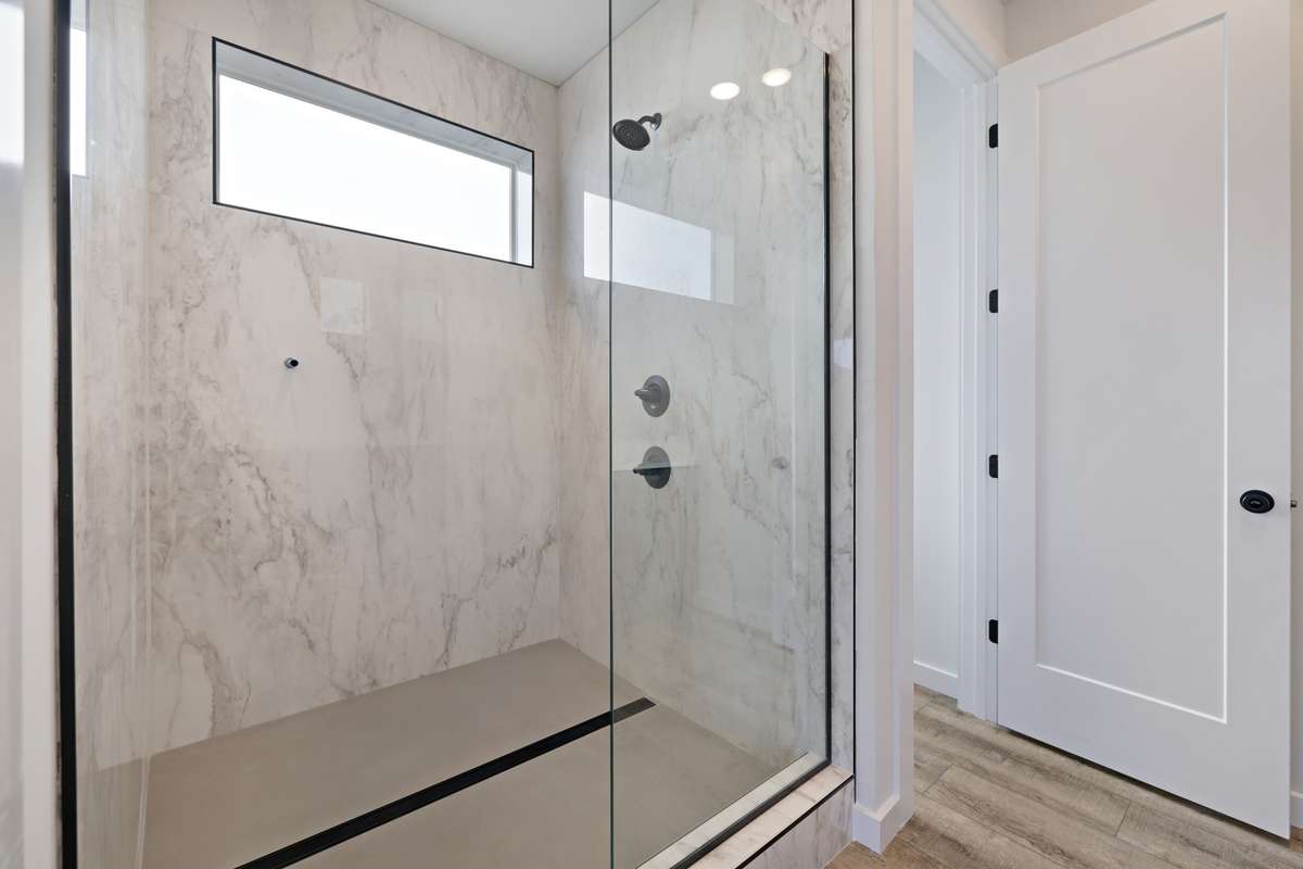 full panel master shower with channel drain.