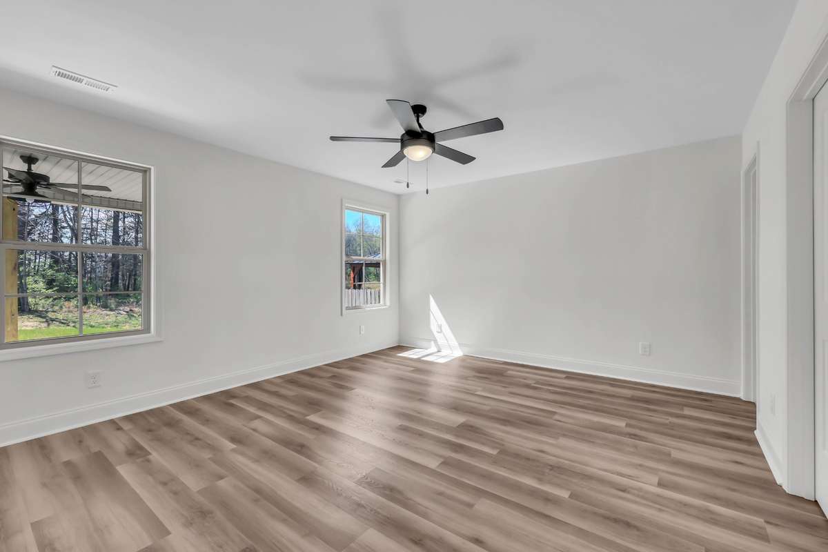 Another view of the master suite with view out to the private back yard