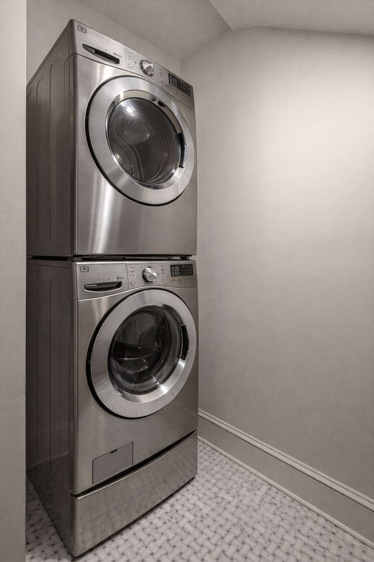 One of two utility rooms. This space was built out during the renovation and is located on the first floor.
