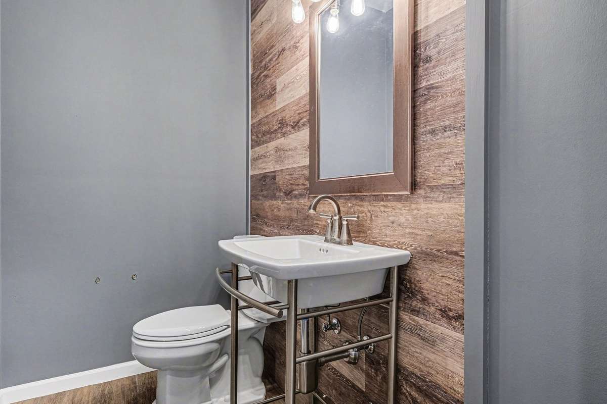 This is a large half bath off the bonus room