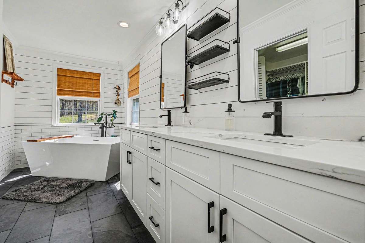 Primary bath has been completely remodeled. This vanity is large with lots of storage!