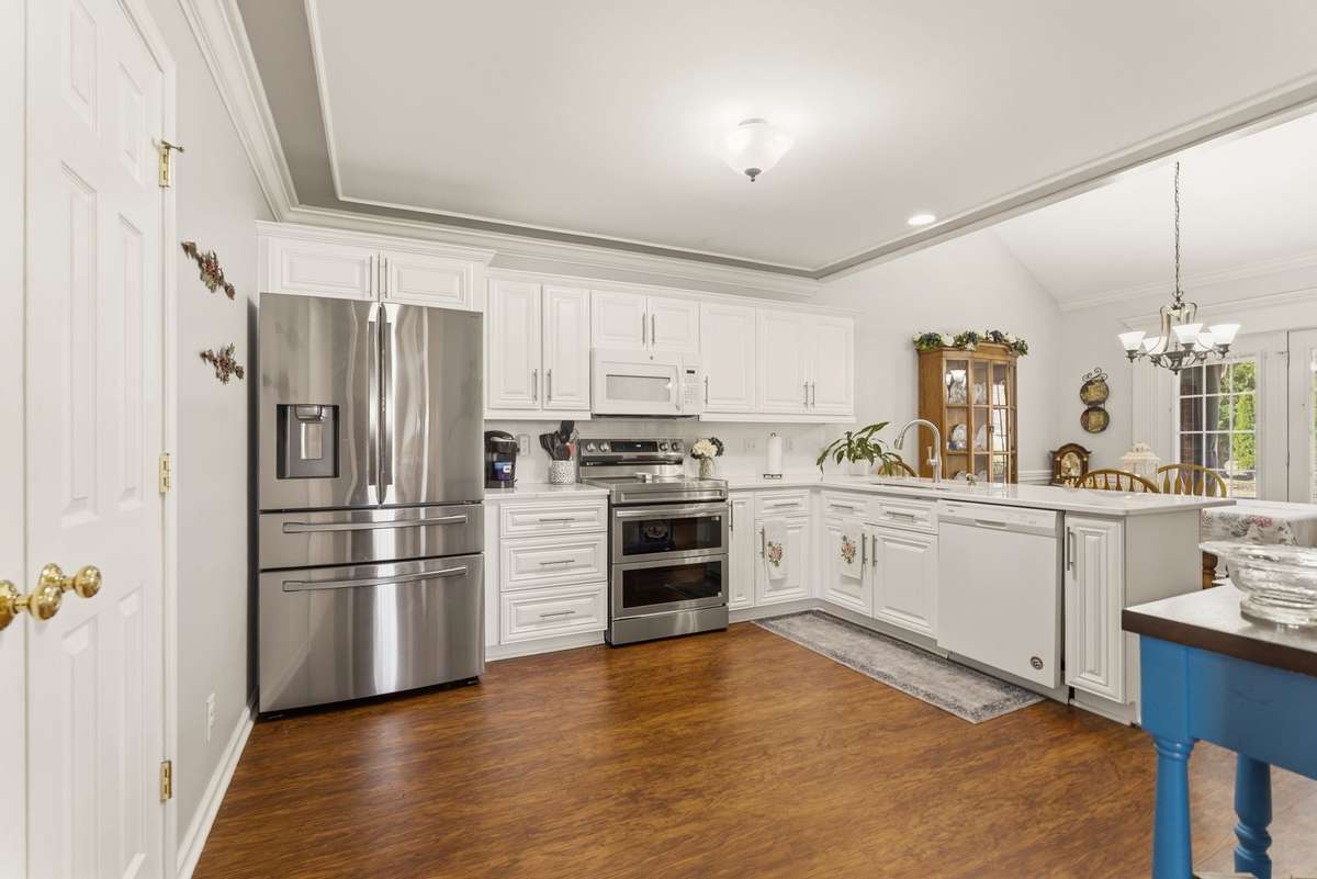 This gourmet kitchen features New Cabinets and New Quartz counters.