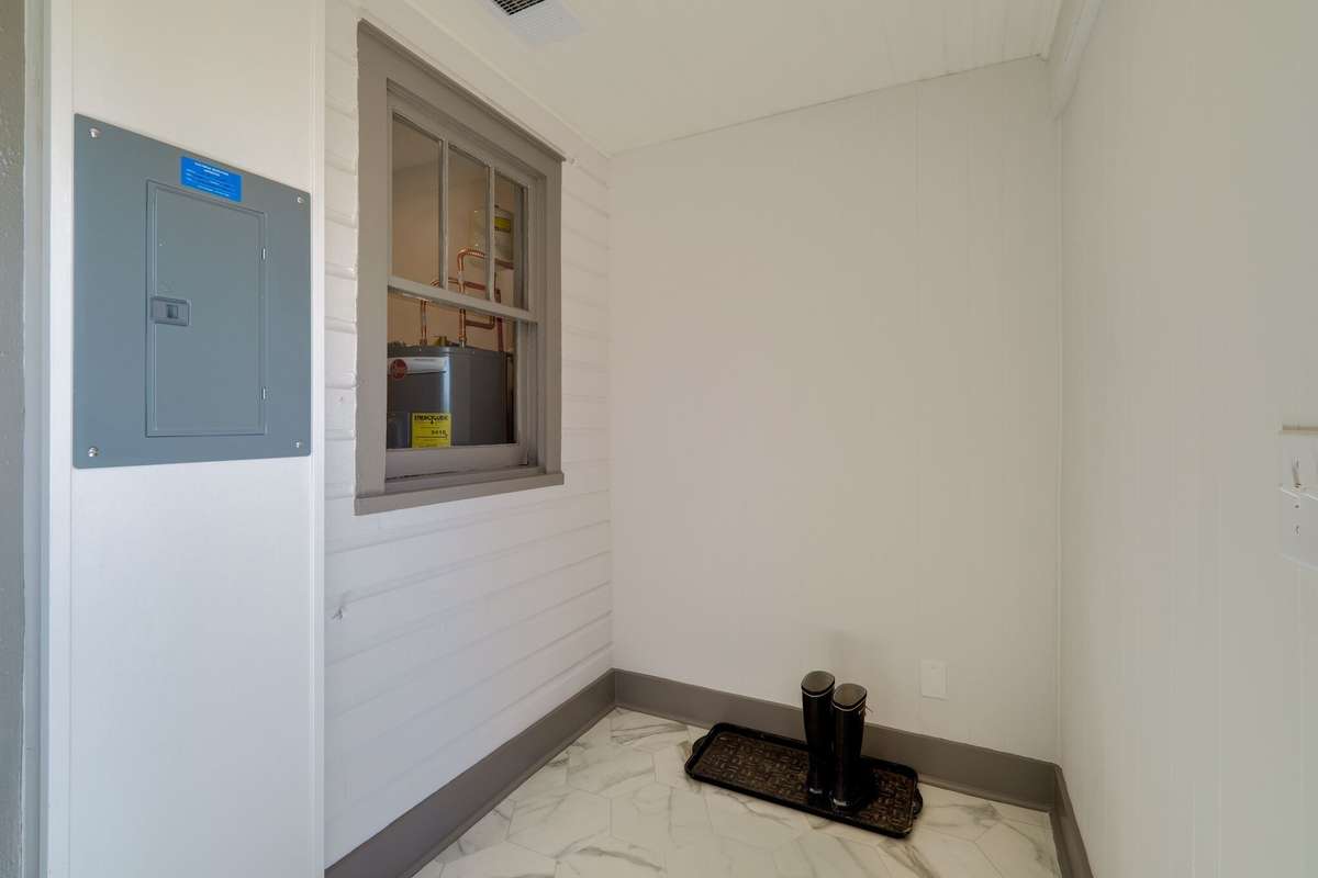 Unit A: Plenty of room for your rain boots, or even a small desk for office space! Photo from 2021.