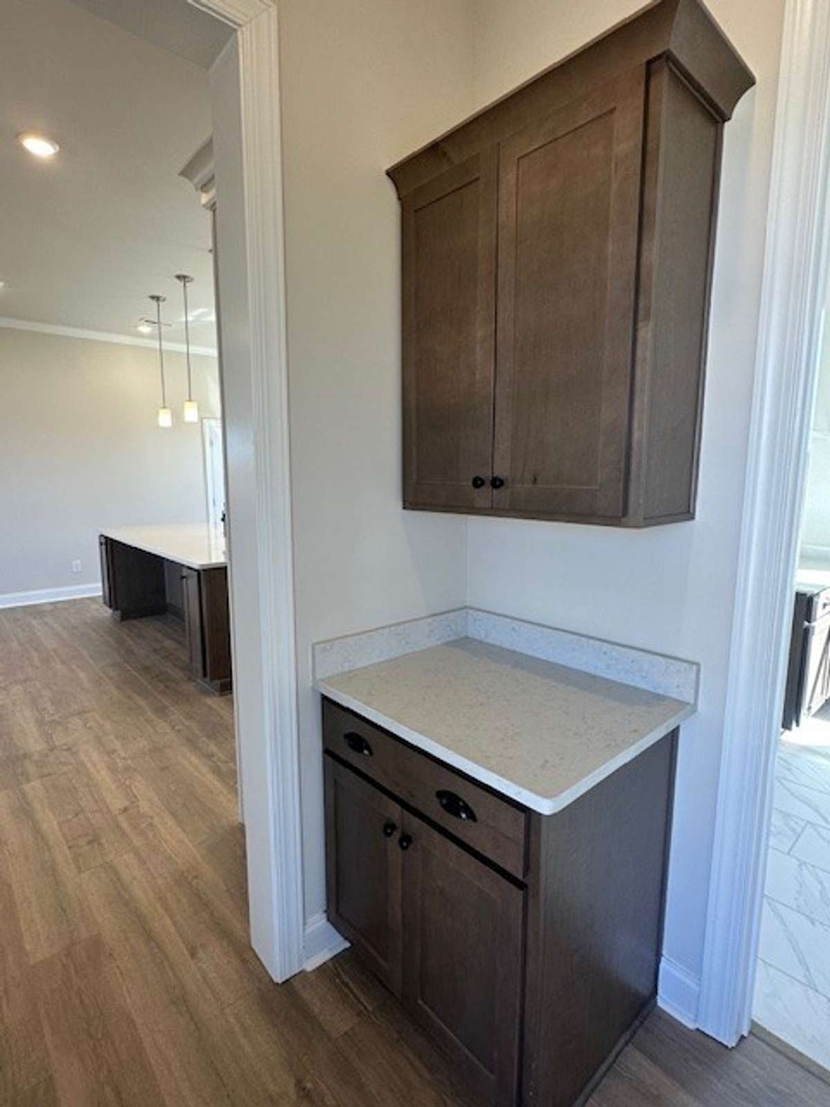 An adorable Coffee Station or Butler's Pantry just off the Kitchen is so convenient!
