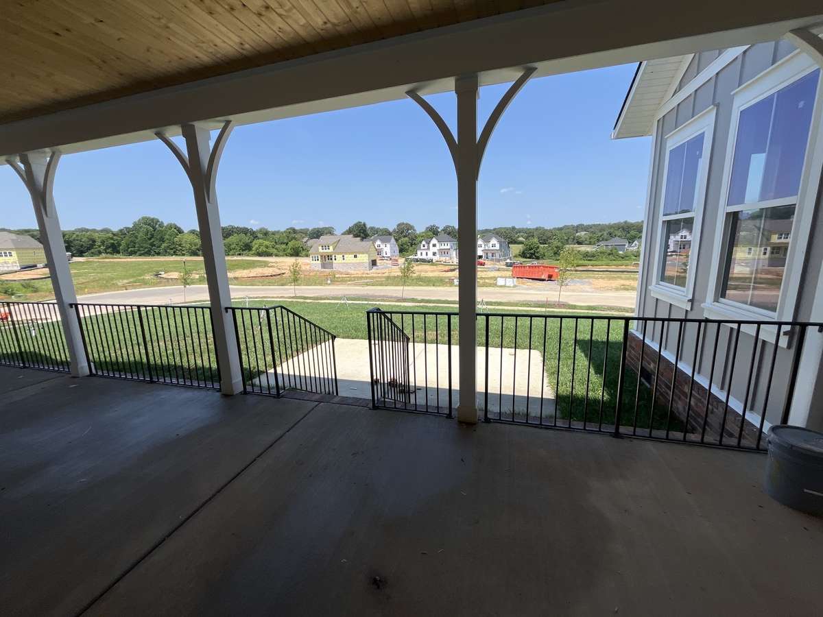 A view from the side porch covered breezeway leading to your patio