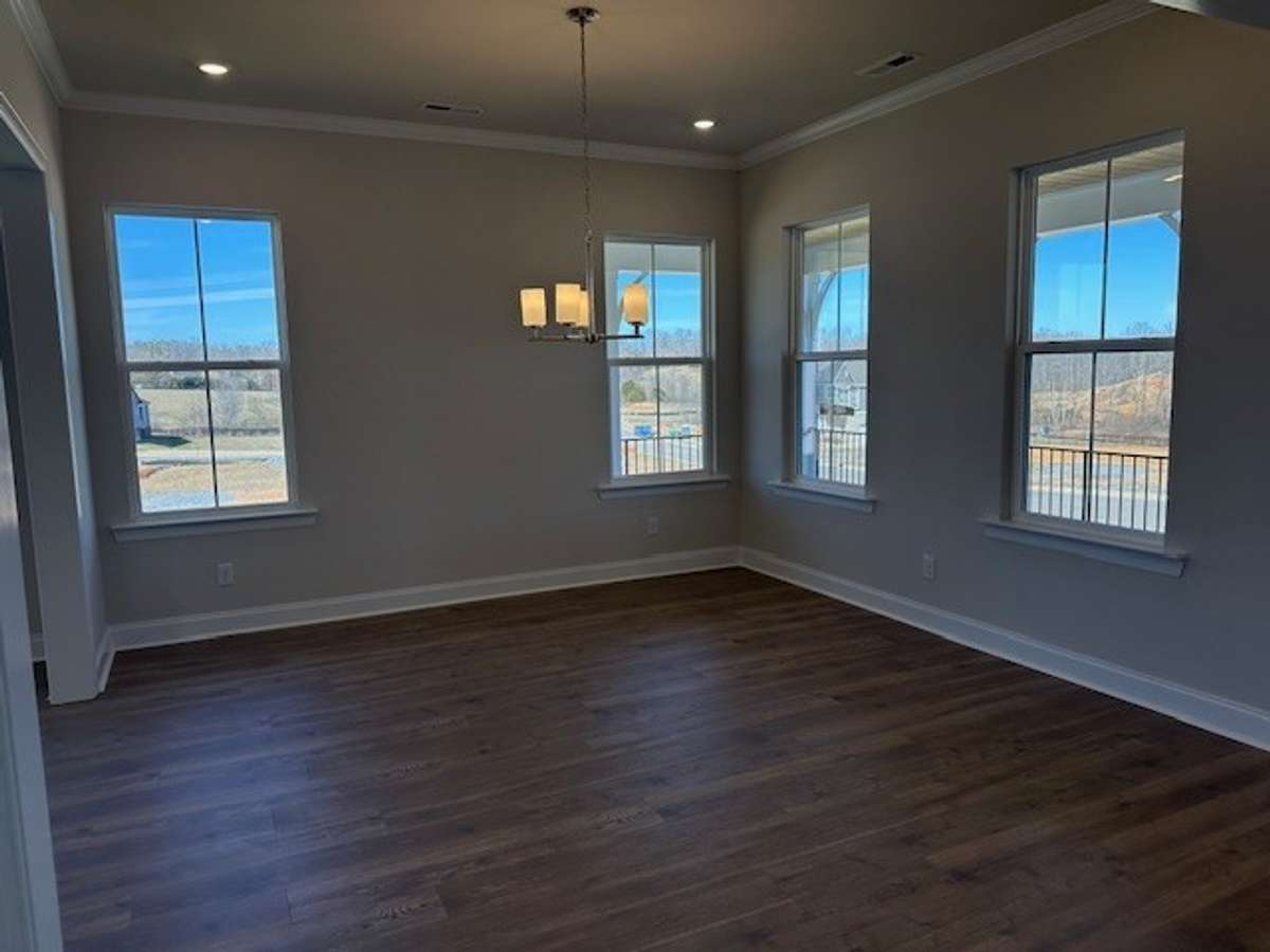 This Dining Room has space for your oversized table, with lots of natural light shining in!