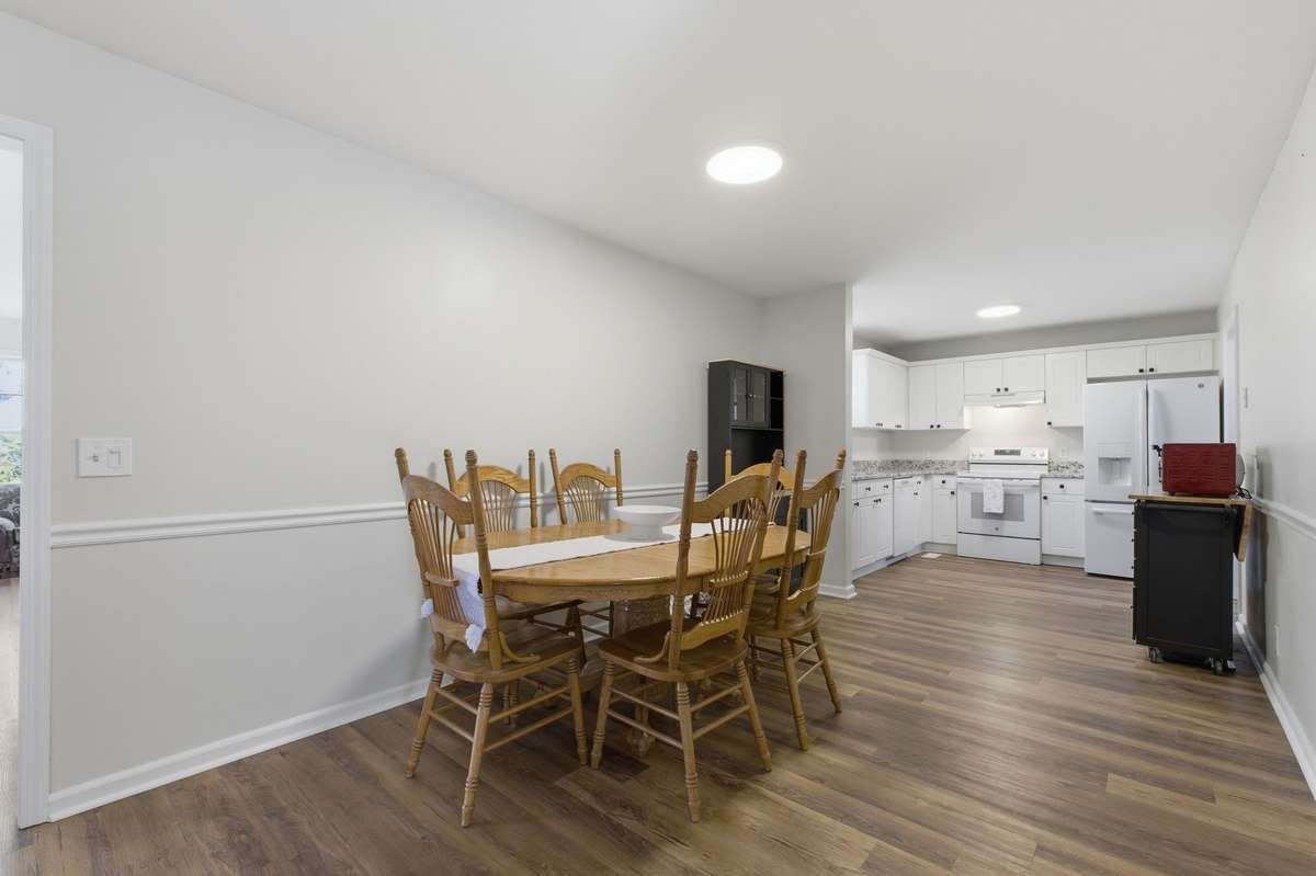 Dining room conveniently opens to the kitchen and can house a large dining room table and china hutch