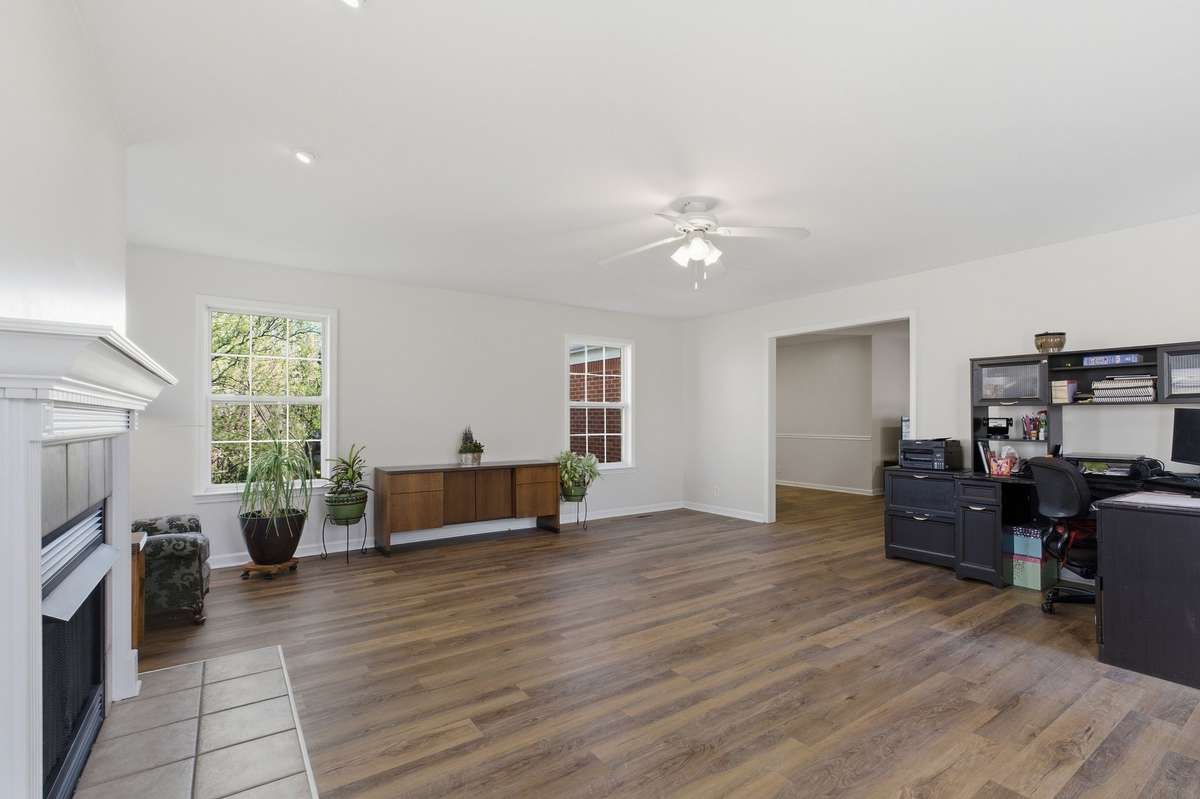 Sellers favorite room of the house is the Den. It's huge and features a gas fireplace, tons of natural lighting and opens to the back deck
