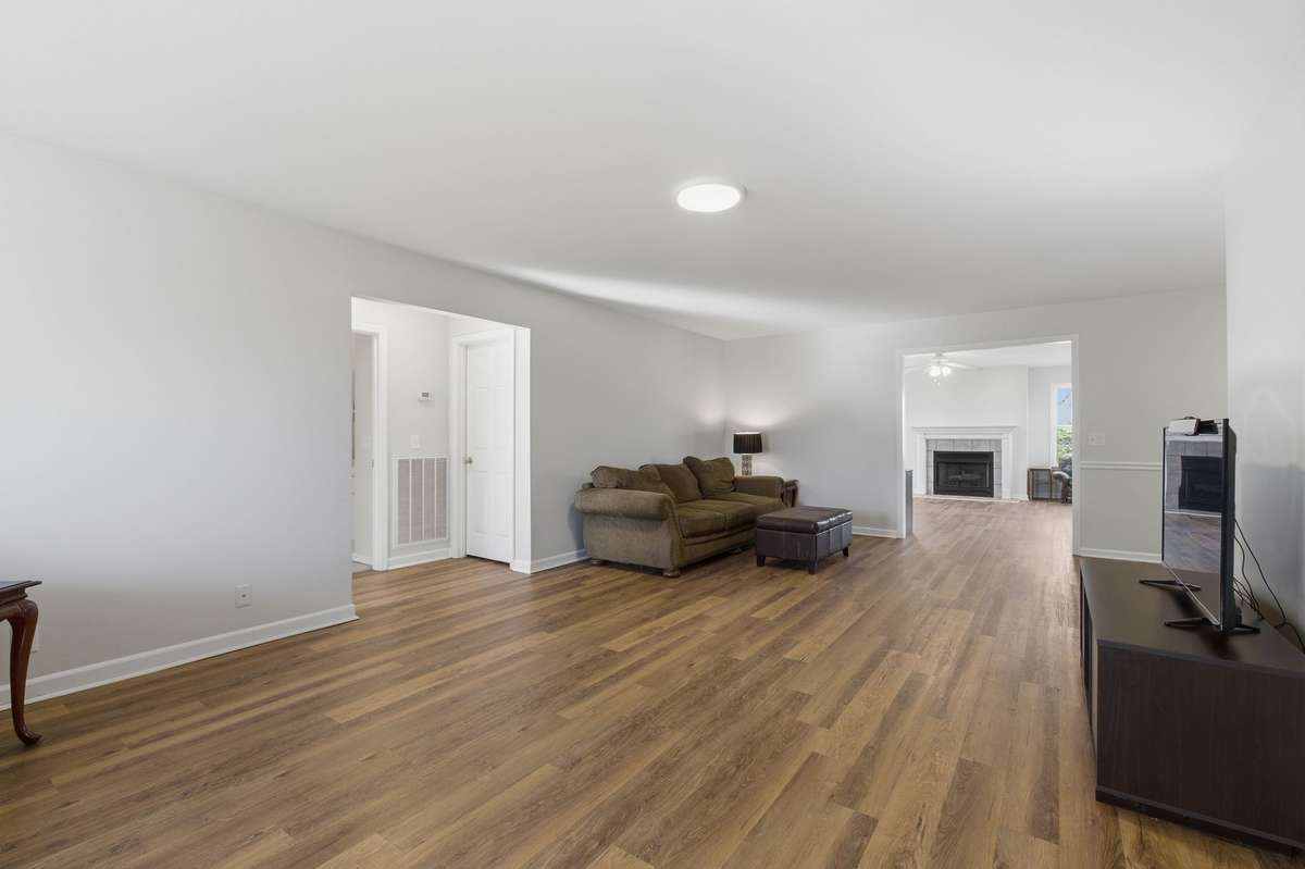 This home boasts a great floor plan with primary and secondary bedrooms located on opposite sides of the home