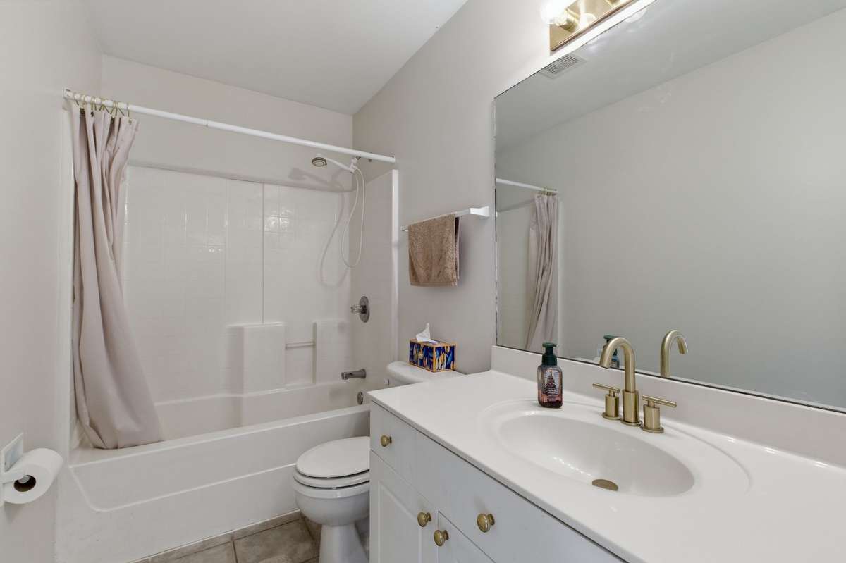 Hall bath also includes updated hardware and shower/tub combo