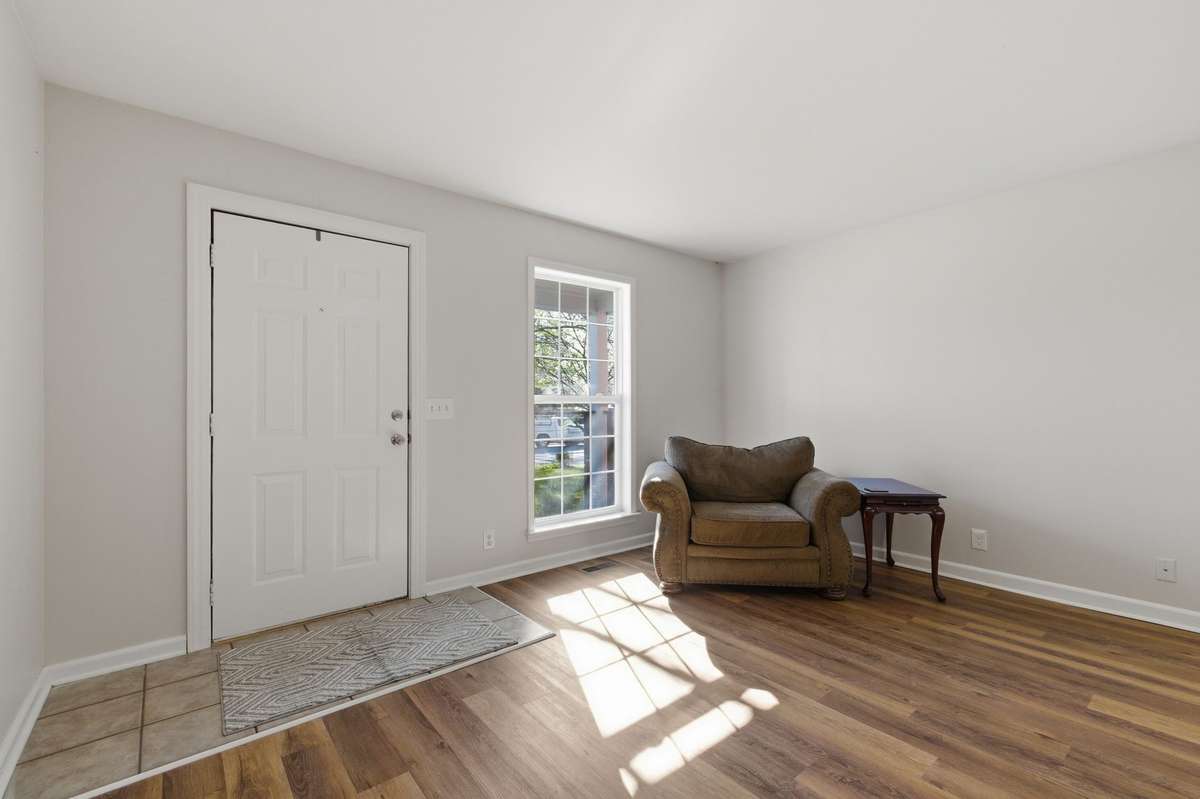 The flooring in the entire home was updated to easy-to-maintain luxury vinyl planks to provide seamless transitions between every room