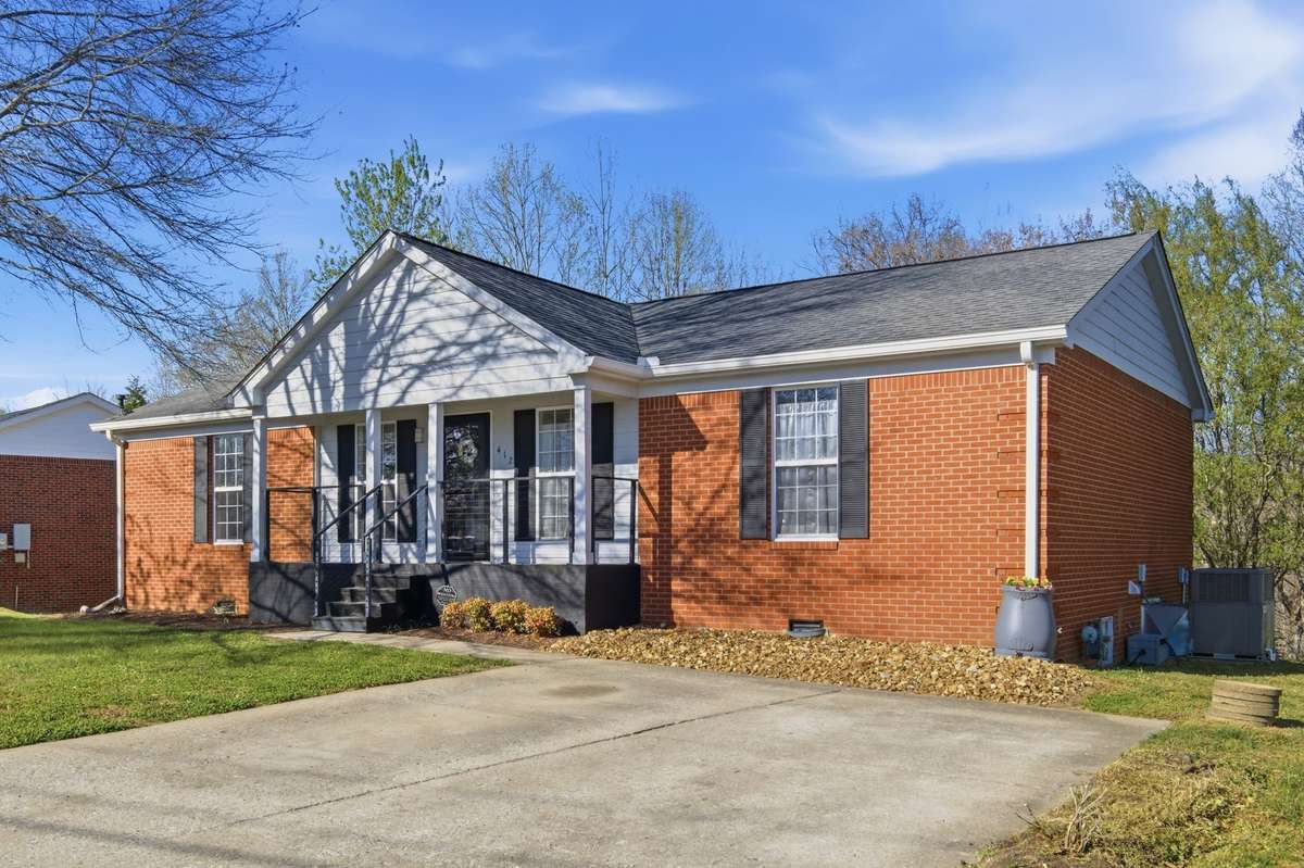 Home has brand new front porch and large level parking pad