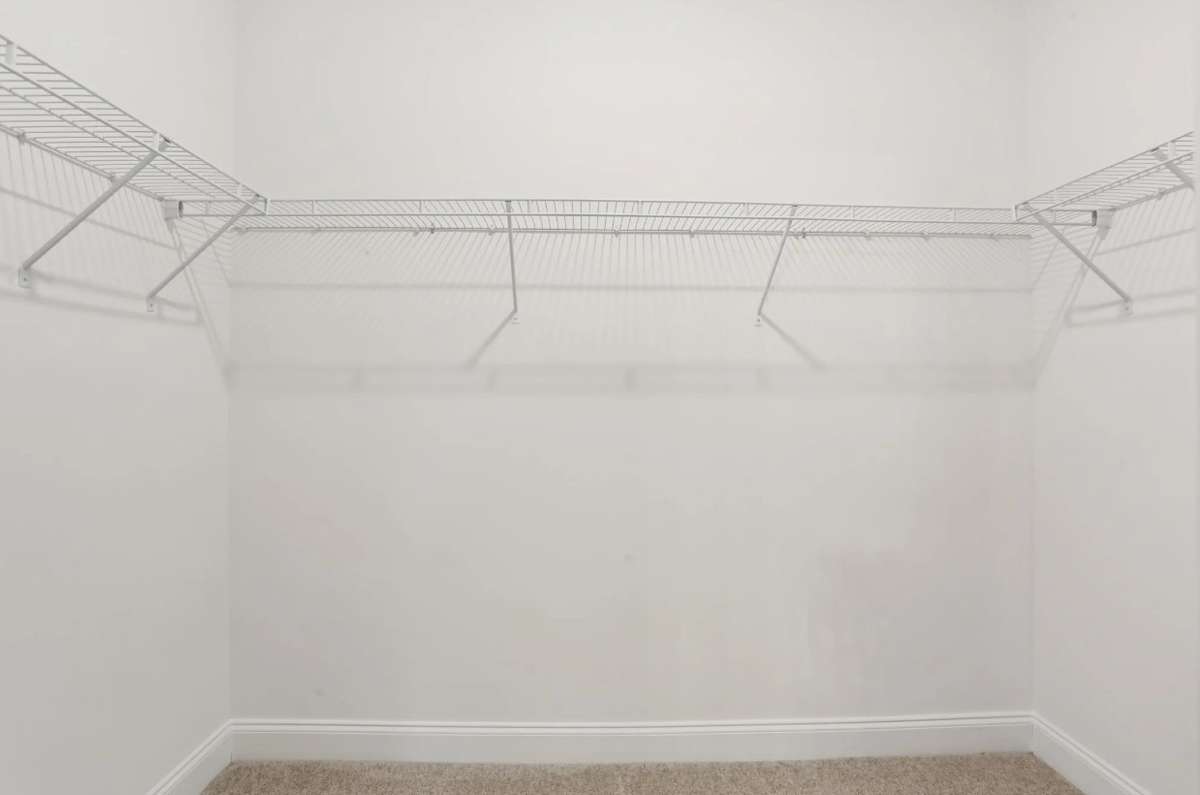 Blake primary closet. Photos of similar home, same plan. Options may vary.