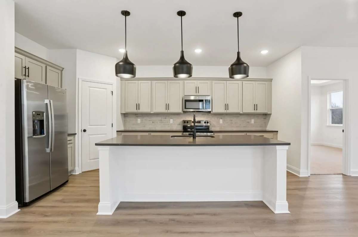 Blake kitchen. Photos of similar home, same plan. Options may vary.