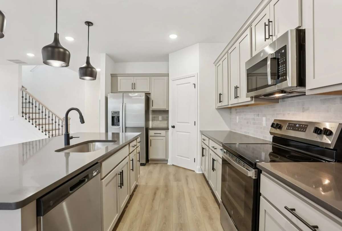 Blake kitchen. Photos of similar home, same plan. Options may vary.