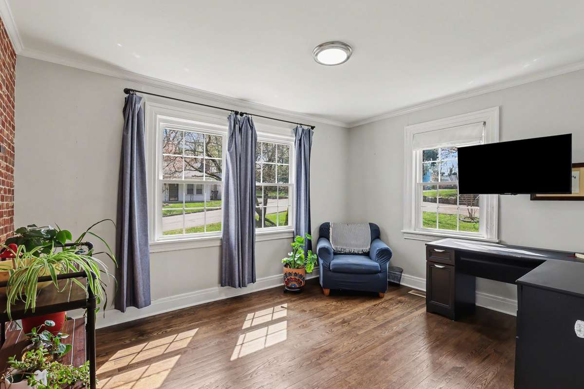 Additional first floor bedroom may be used as home office.