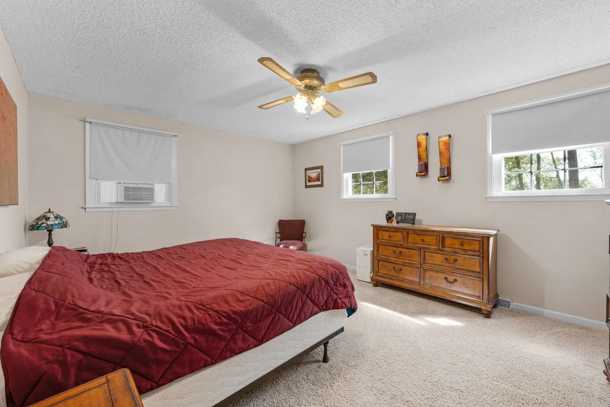 Upstairs is the Primary Bedroom with en suite bathroom