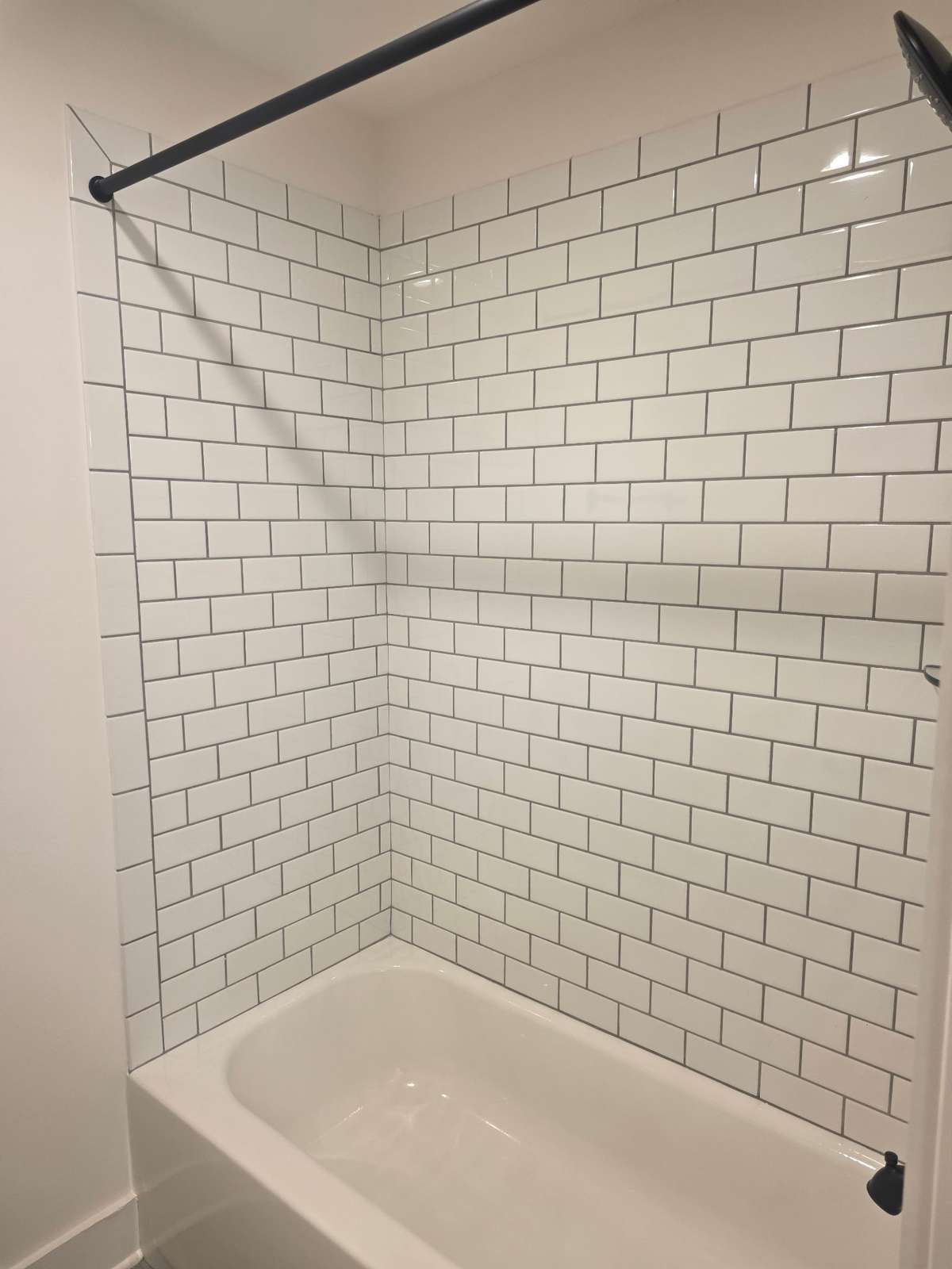Tile surround in secondary bath showers