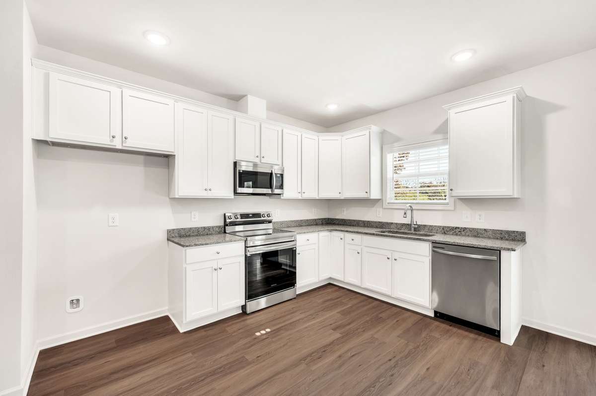 The open-plan kitchen ensures those preparing food are part of the conversation, keeping the space connected and social no matter the occasion.