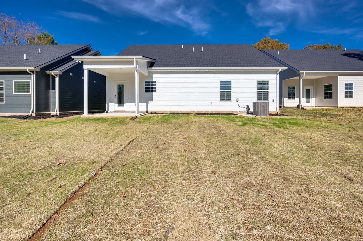 Spacious side and backyard with plenty of room to grow.