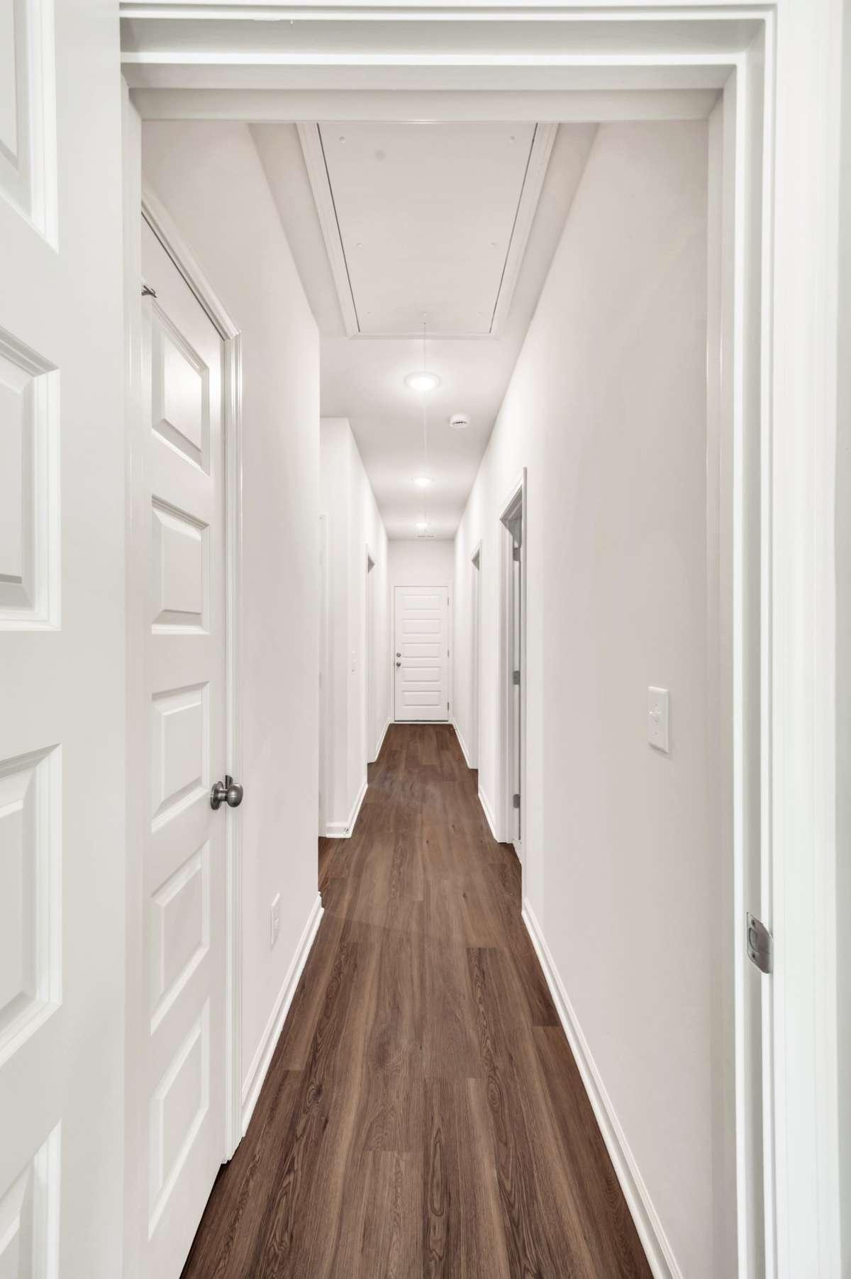 A wide hallway makes an ideal gallery for displaying artwork.