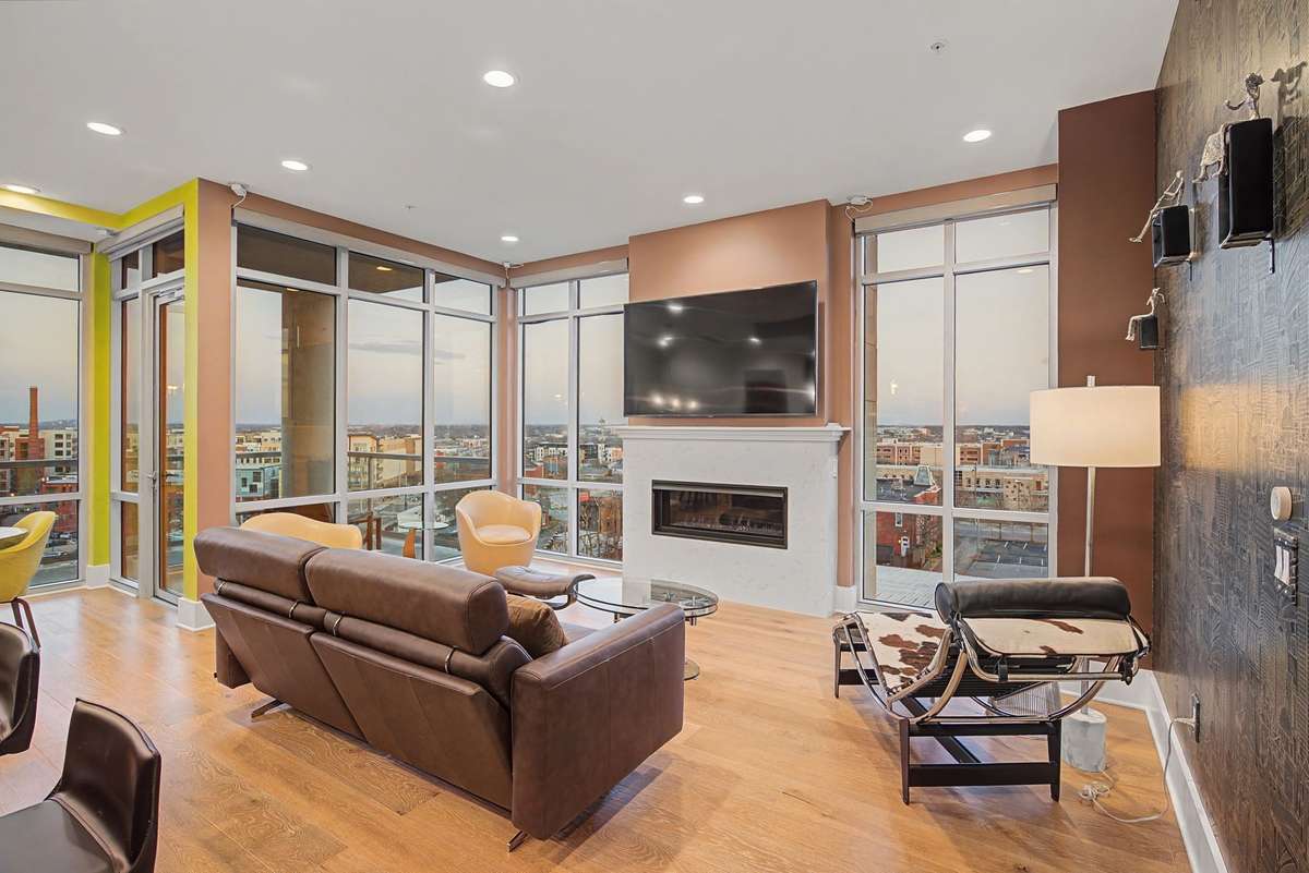 Living room with floor-to-ceiling windows and Gas Fireplace