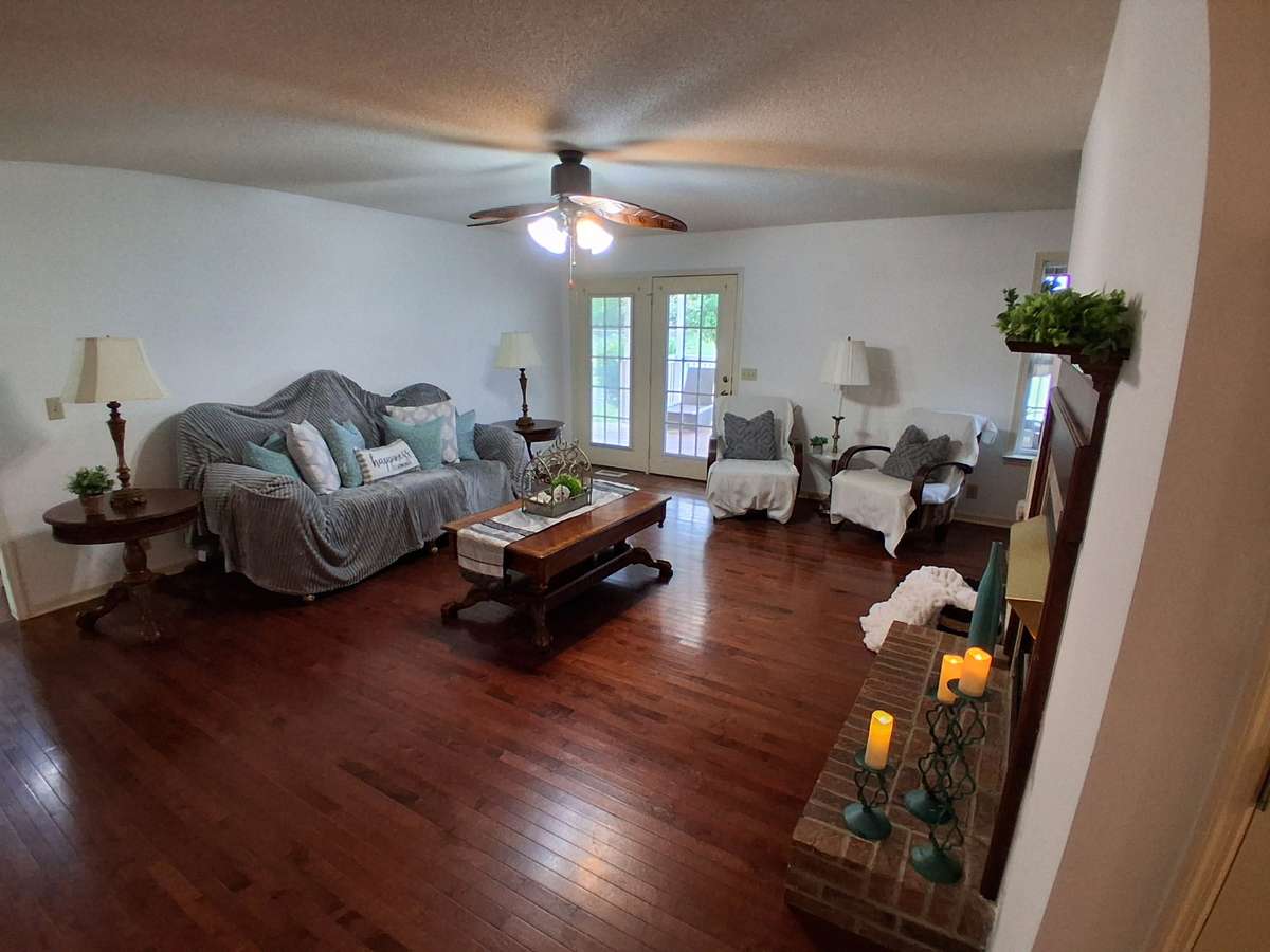 Living room has a new fresh coat of paint.