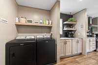 Utility room. There is a large panty/butler's pantry here as well.