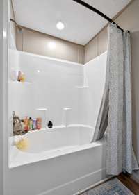 Shower/tub combo.