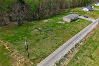 Relax and unwind on your very own 5 acres. You’ll love evening here at one of the two firepits watching the stars. Wide lot for a garage, large garden, fence for pets.