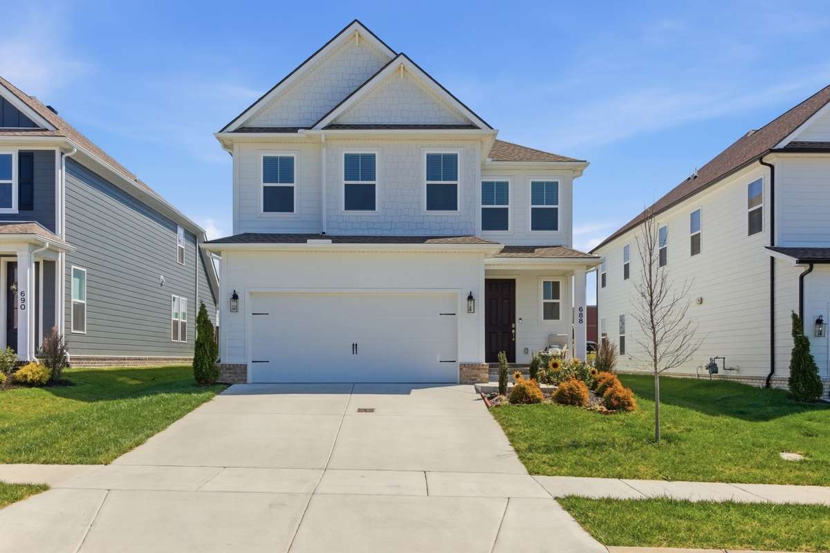 Front exterior view of this beautiful two-story home with a two-car garage.