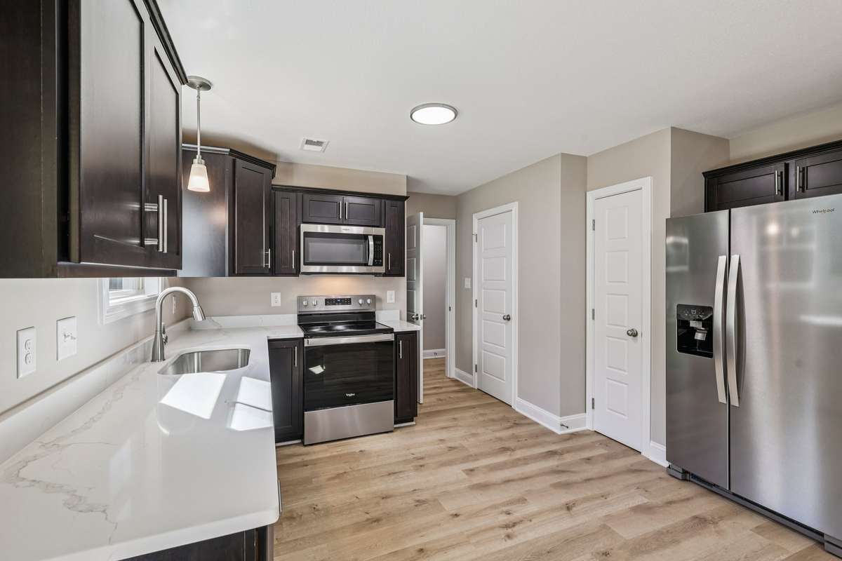 Sample pictures from a previous build showing the Baker Floor Plan.  Materials and colors are subject to change without notice.
