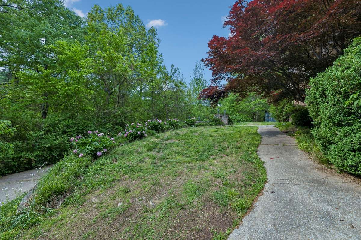 Beautiful established landscaping in place.  Home could use a little TLC, as it has been empty for a bit.