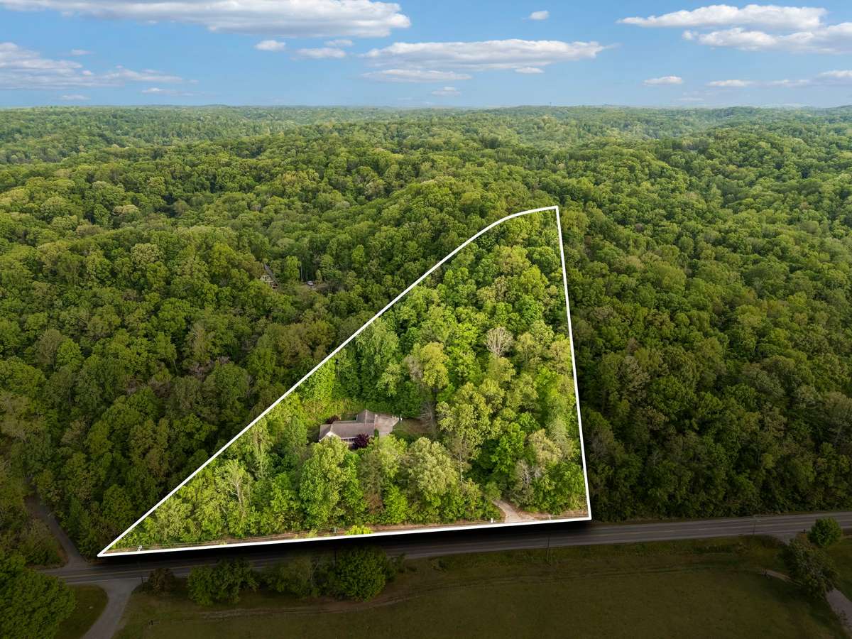 5 wooded acres on Charlotte Pike, minutes from downtown Nashville!