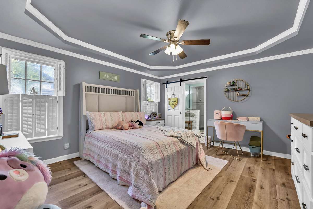 Main floor primary bedroom with renovated bath